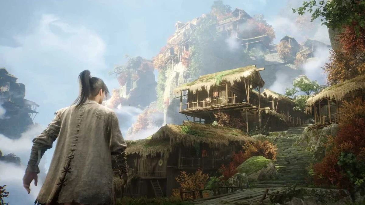 Stylised mountain valley with a robed character looking up at a treehouse village built into autumn cliffs - an environment scene illustrating mid-poly stylised art for game backgrounds