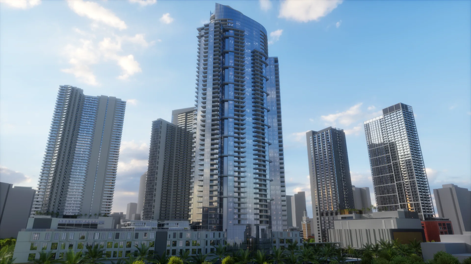 Cluster of glass high-rise towers seen from street level against a blue sky